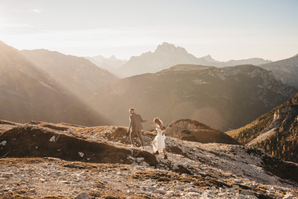 Couple hiking in scenic mountain landscape