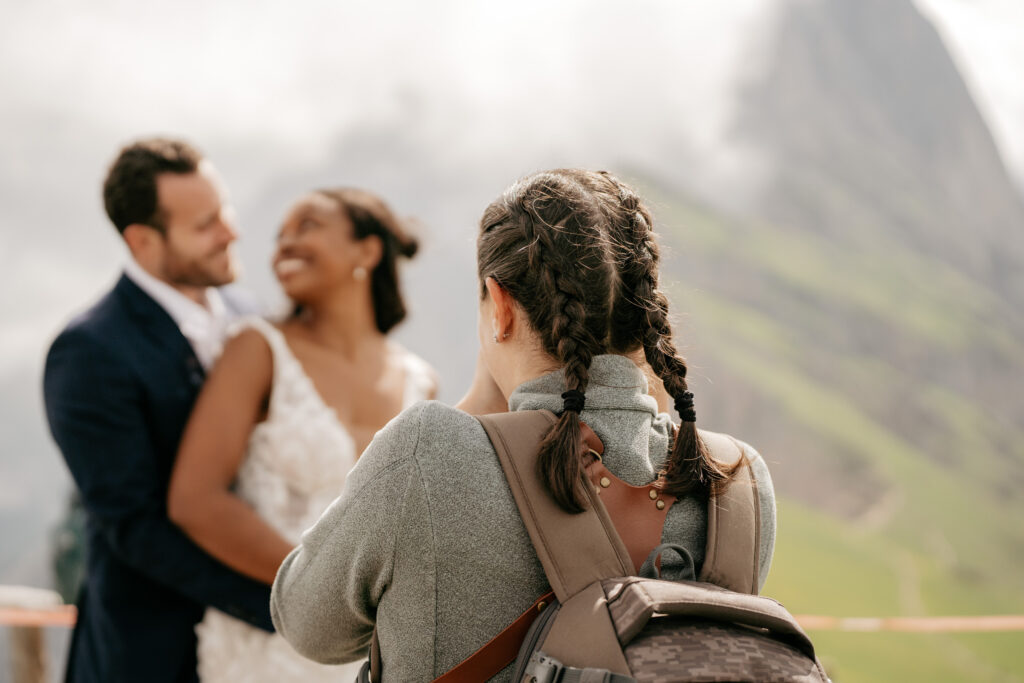 Photographer captures couple's wedding moment outdoors