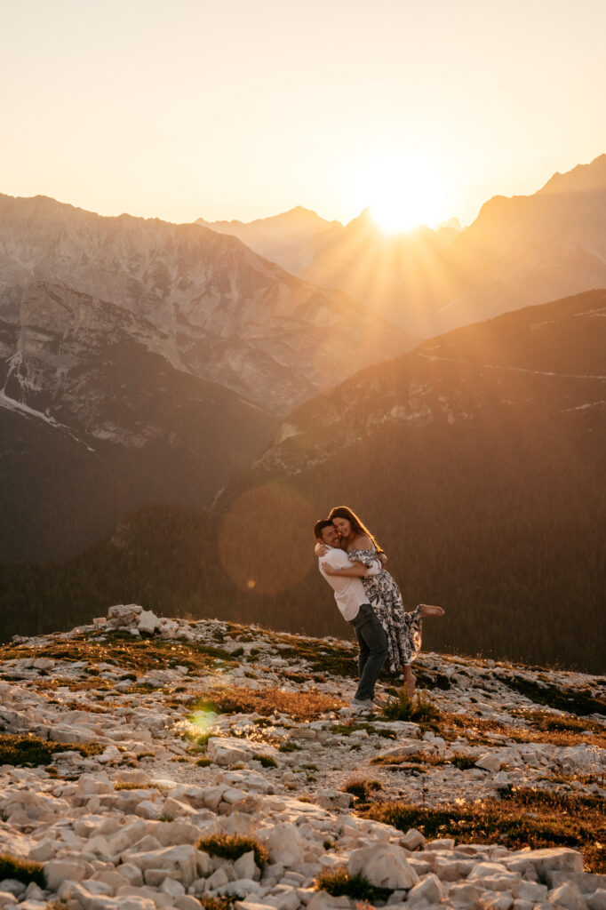 Couple embracing during mountain sunset