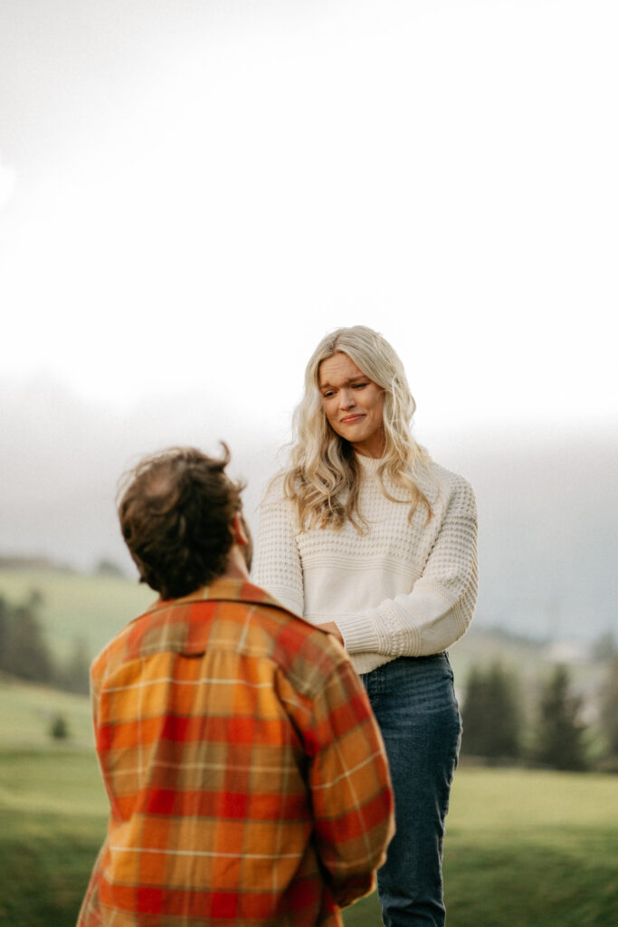 Couple engaged in outdoor proposal scene