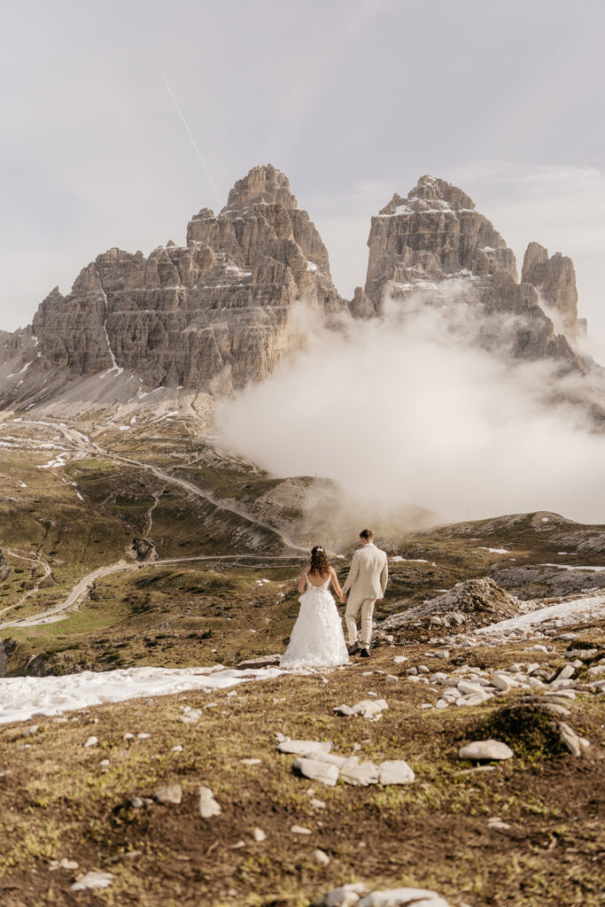 Couple walking in scenic mountain landscape