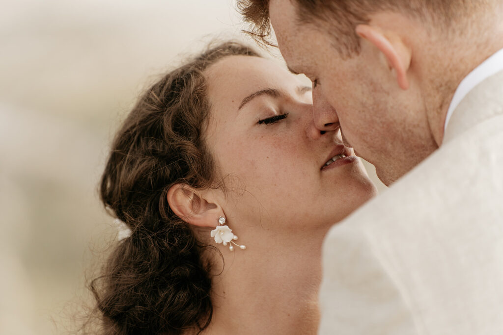 Couple about to kiss, close-up portrait