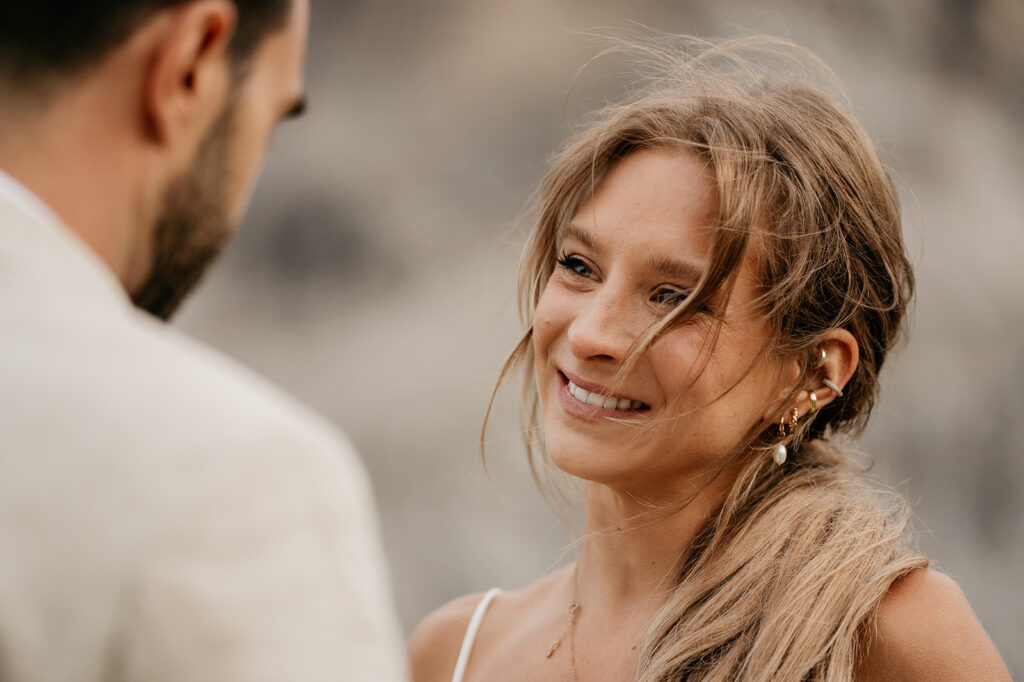 Woman smiling at man during outdoor event