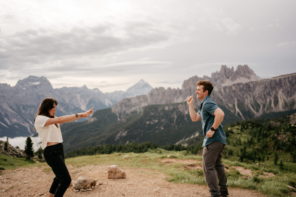 Couple dancing in mountainous landscape