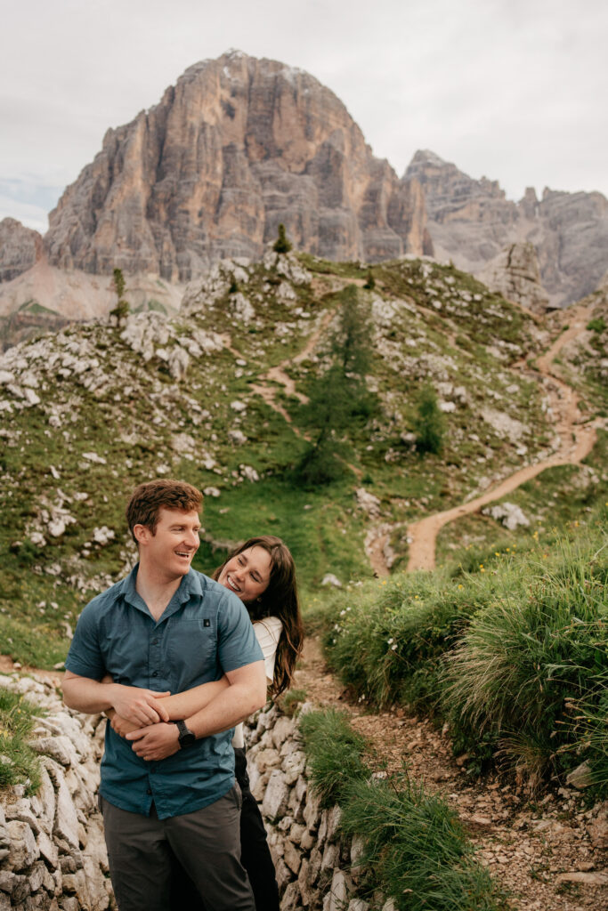 Couple smiling in mountain landscape