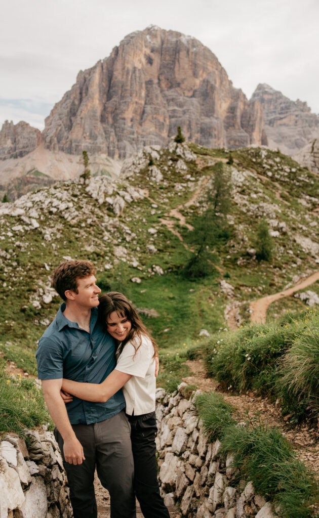 Couple embracing in mountainous landscape