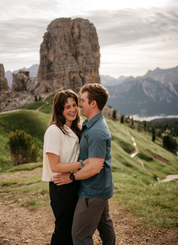 Couple embracing in scenic mountain landscape