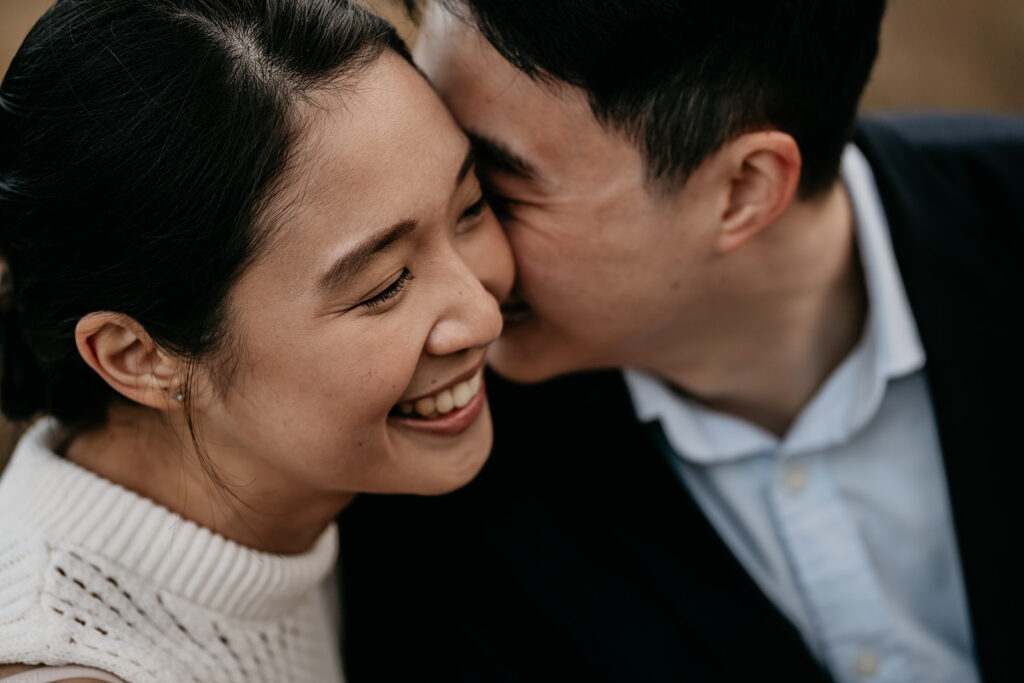 Smiling couple sharing a tender moment together.