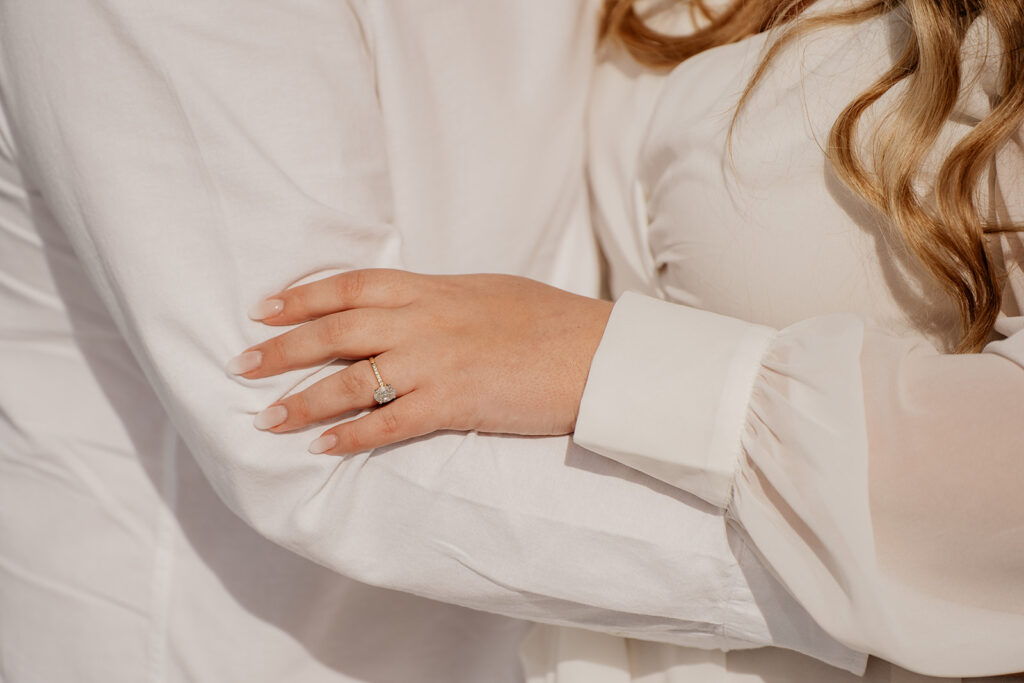 Close-up of hand with engagement ring