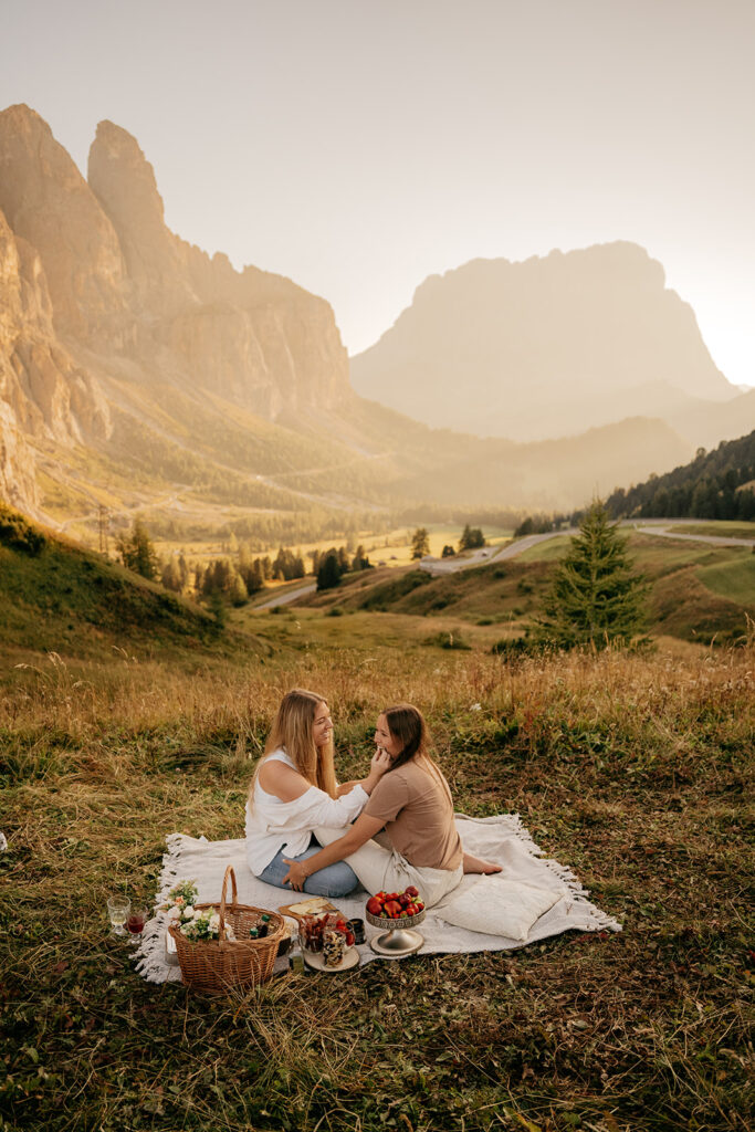 Couple picnicking in picturesque mountain landscape