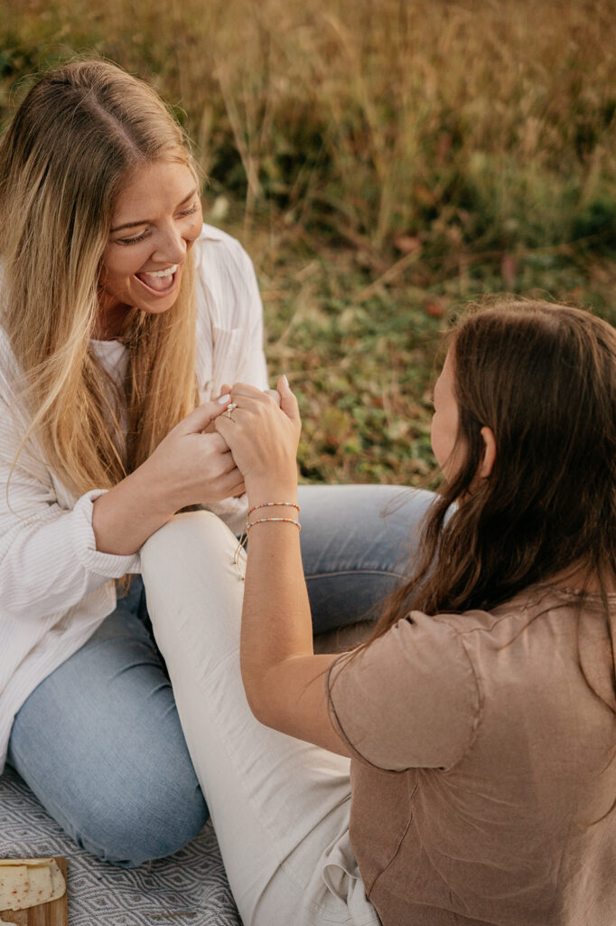 Two friends enjoying a heartfelt outdoor conversation