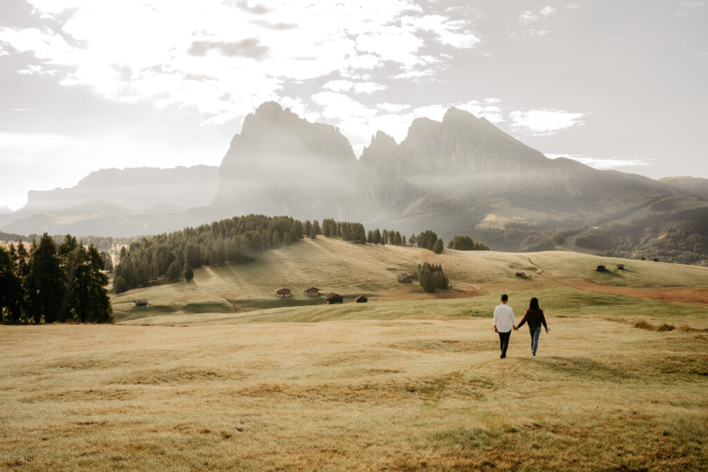 Couple walking in scenic mountain landscape