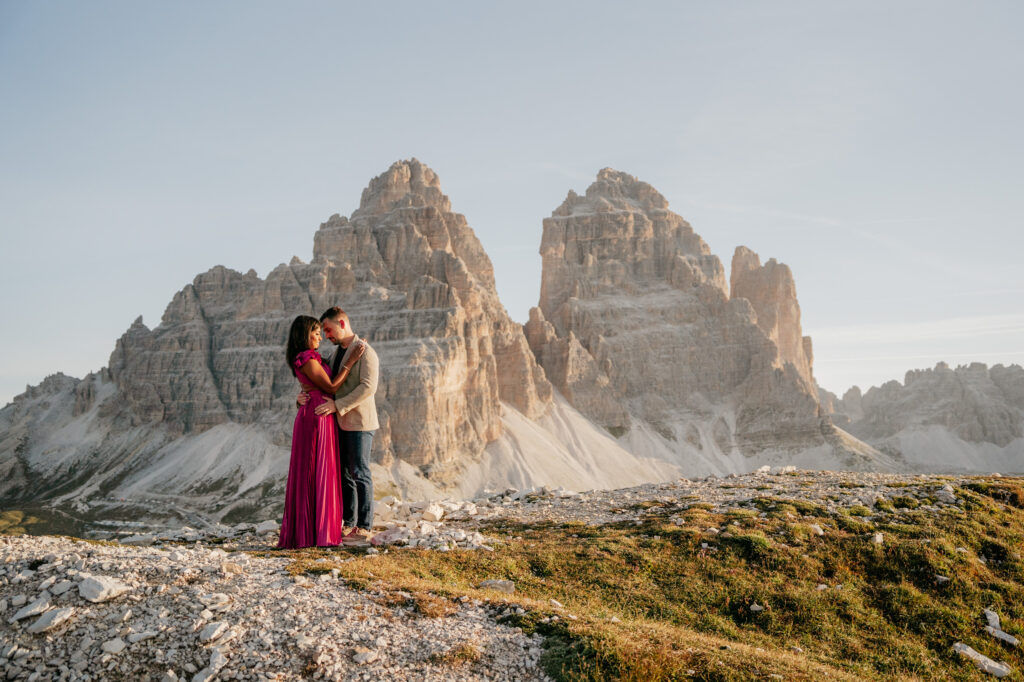 Couple embracing in mountainous landscape