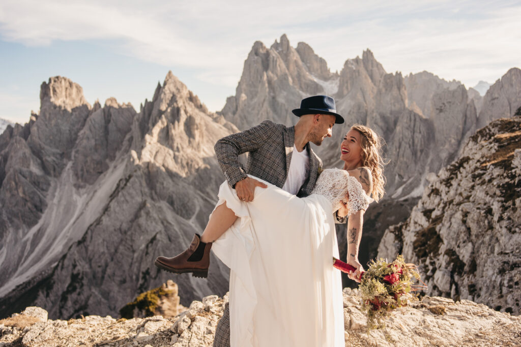 Wedding couple in mountains, romantic moment captured