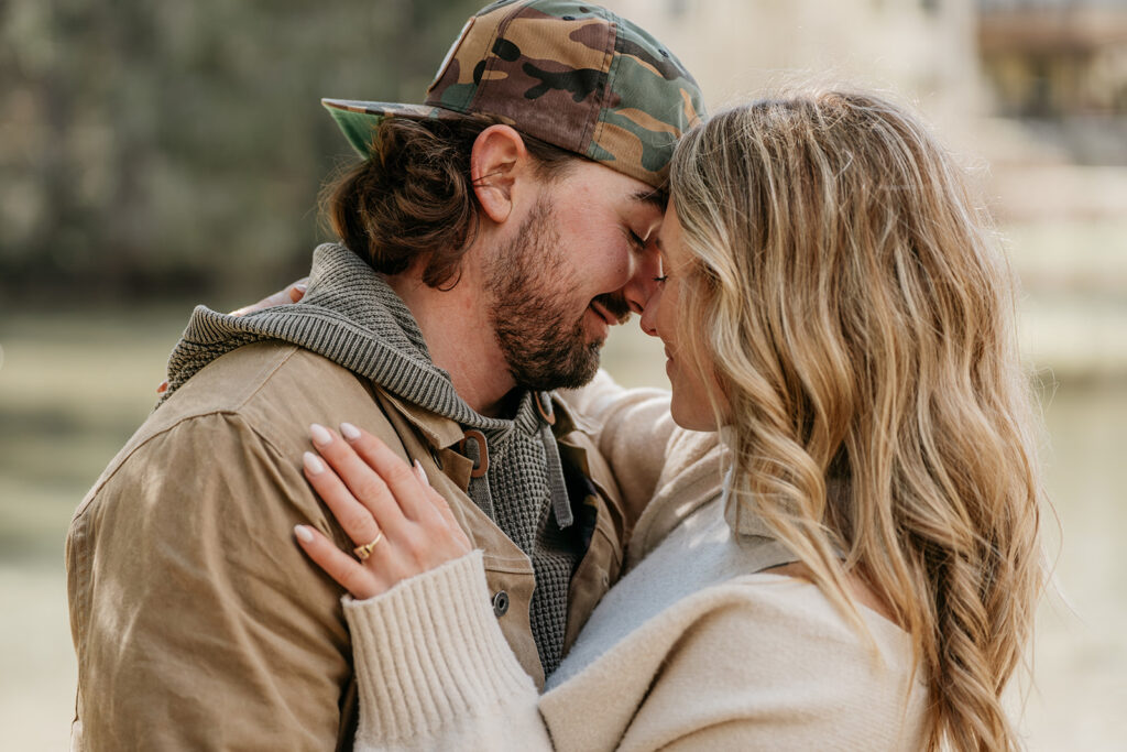 Couple embracing closely outdoors