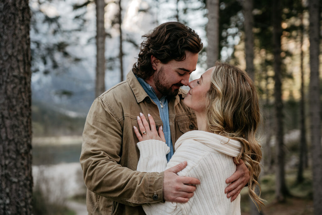 Couple embracing in a forest setting