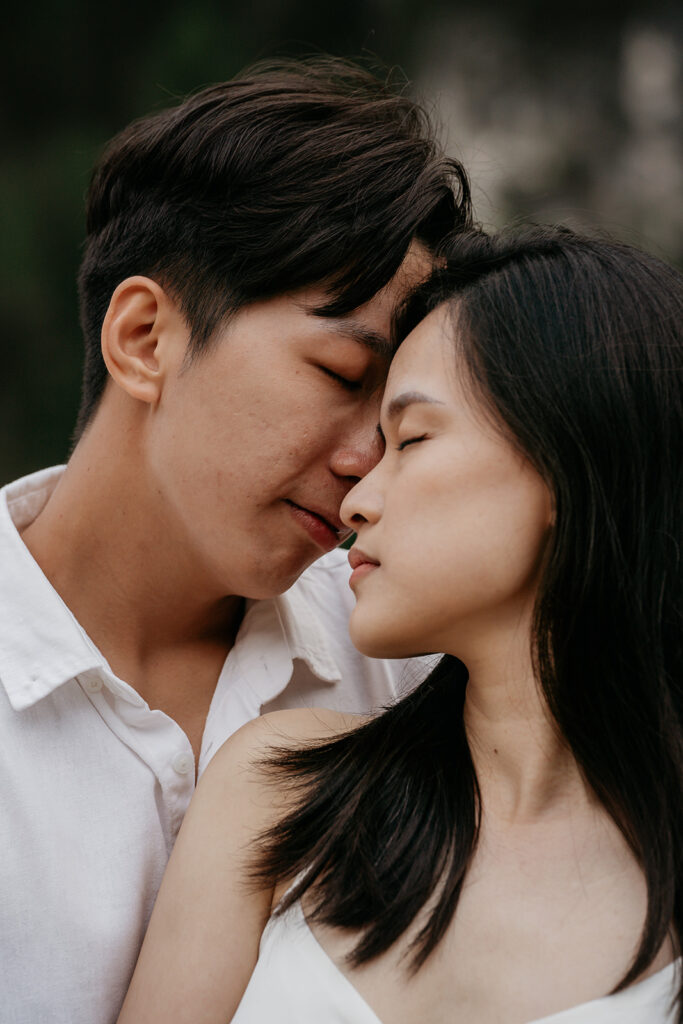 Couple embracing with eyes closed