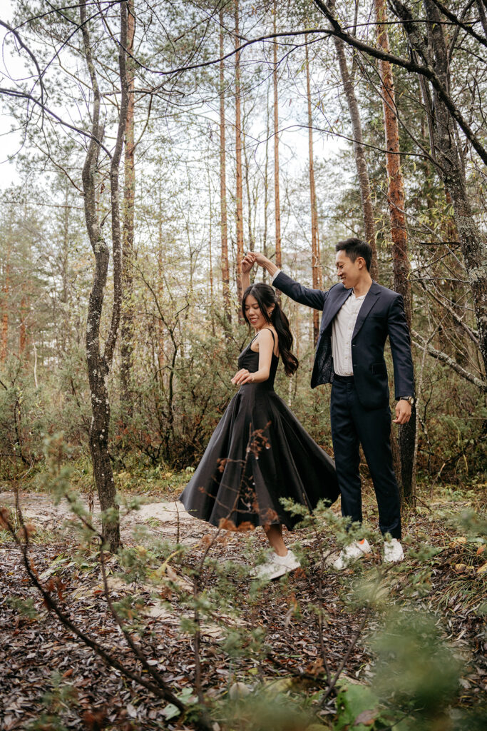 Couple dancing in forest