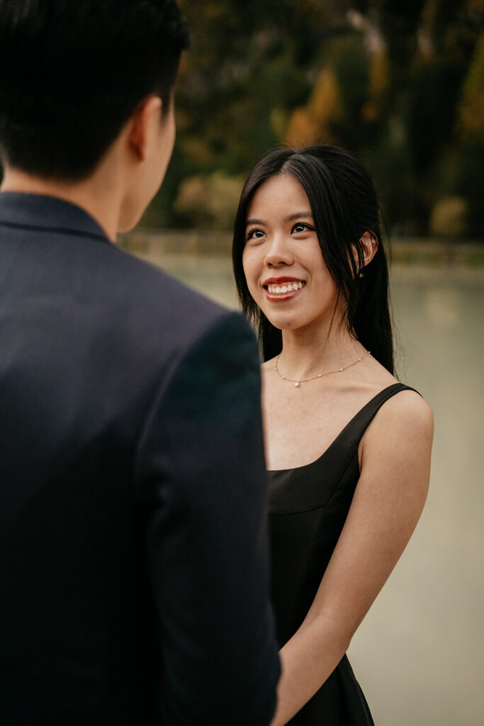 Couple sharing a moment by the lake