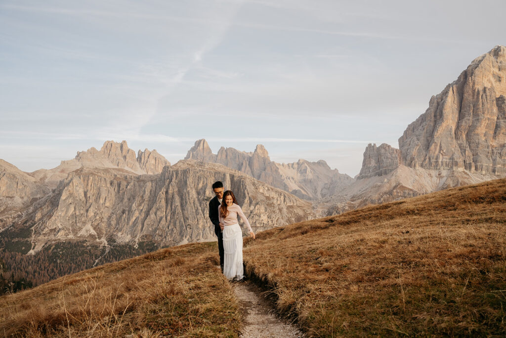 Couple embracing in mountainous landscape