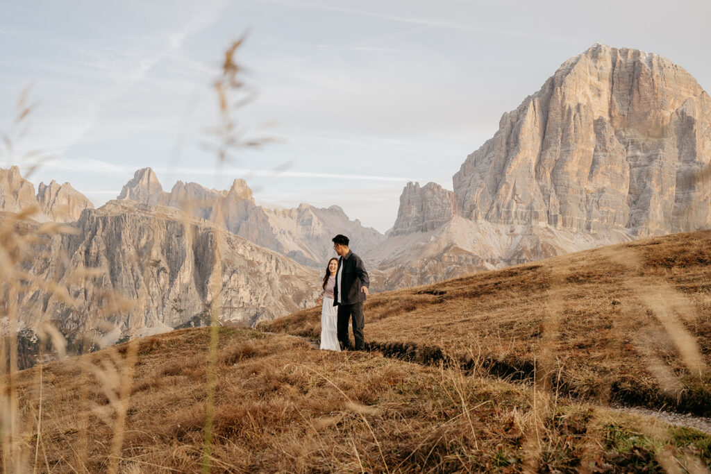 Couple walking in scenic mountain landscape