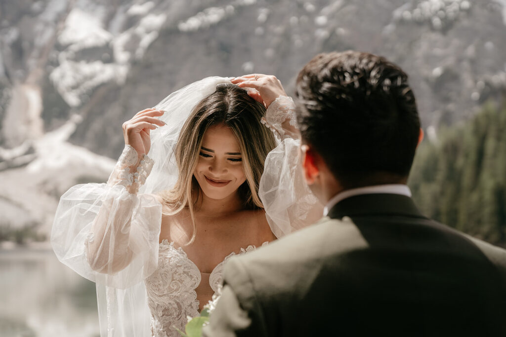 Bride and groom in mountain wedding ceremony.