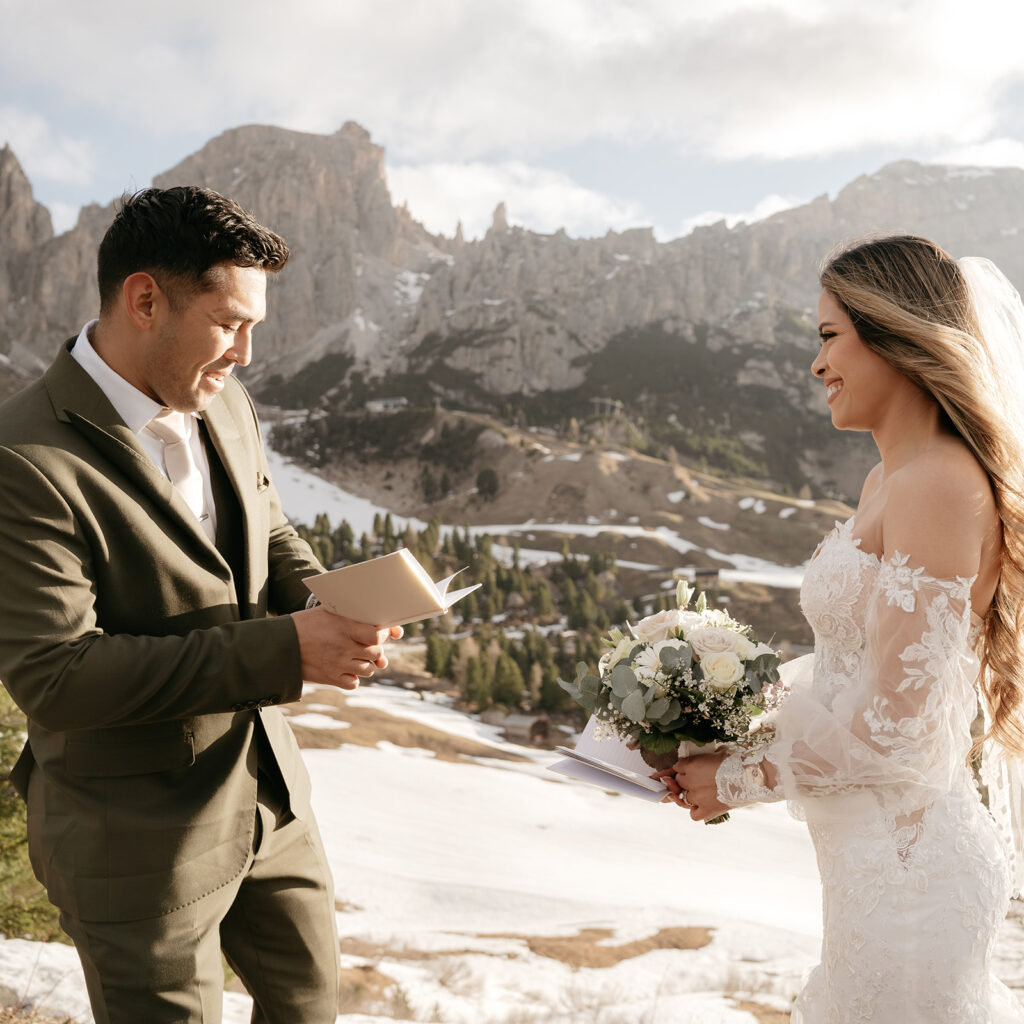 Couple exchanging vows in scenic mountain wedding