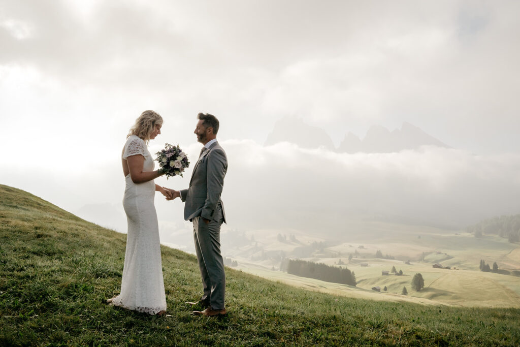 Wedding couple in scenic mountain landscape