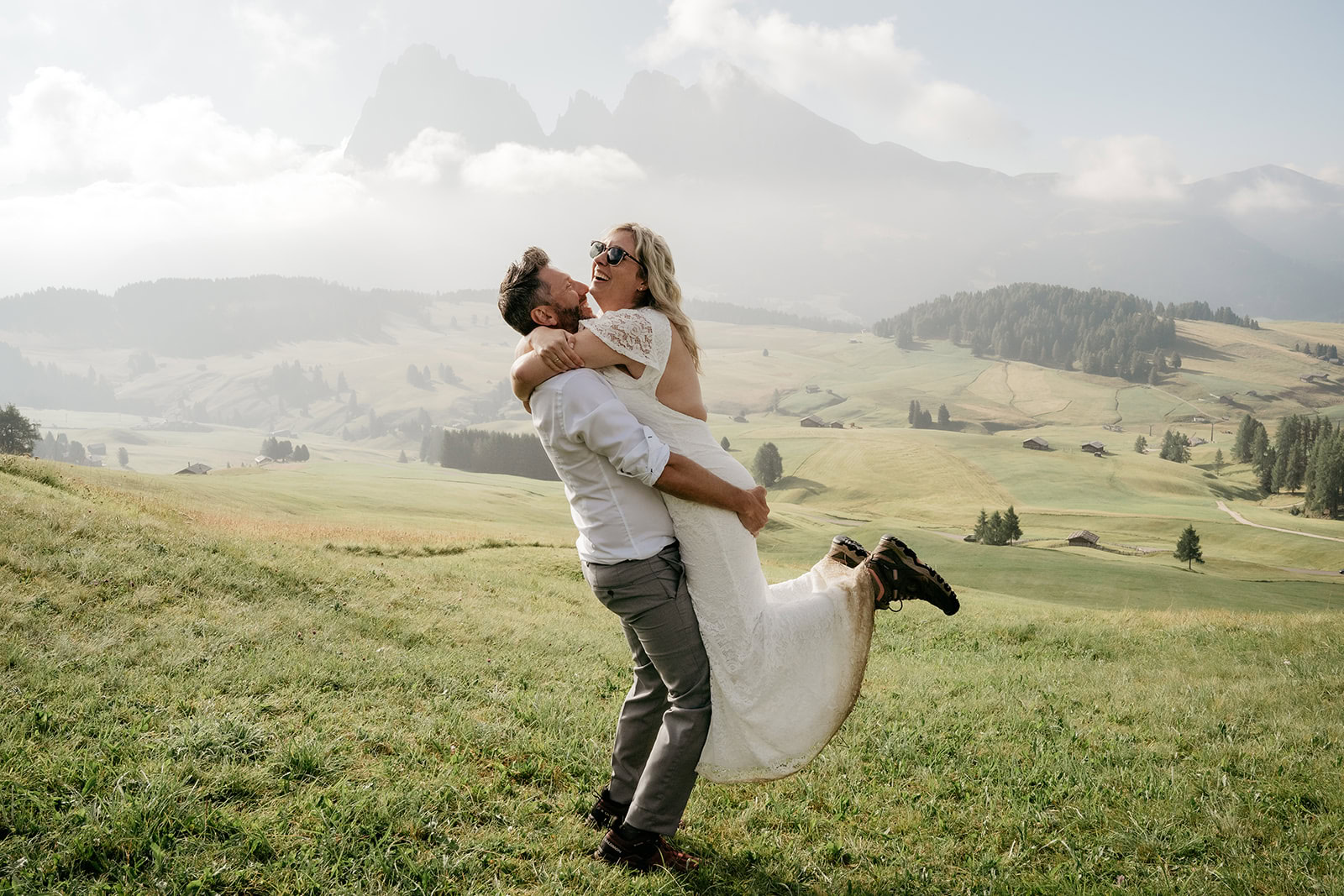 Couple embracing in scenic mountain landscape