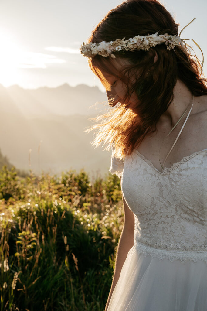 Bride in lace dress at sunset