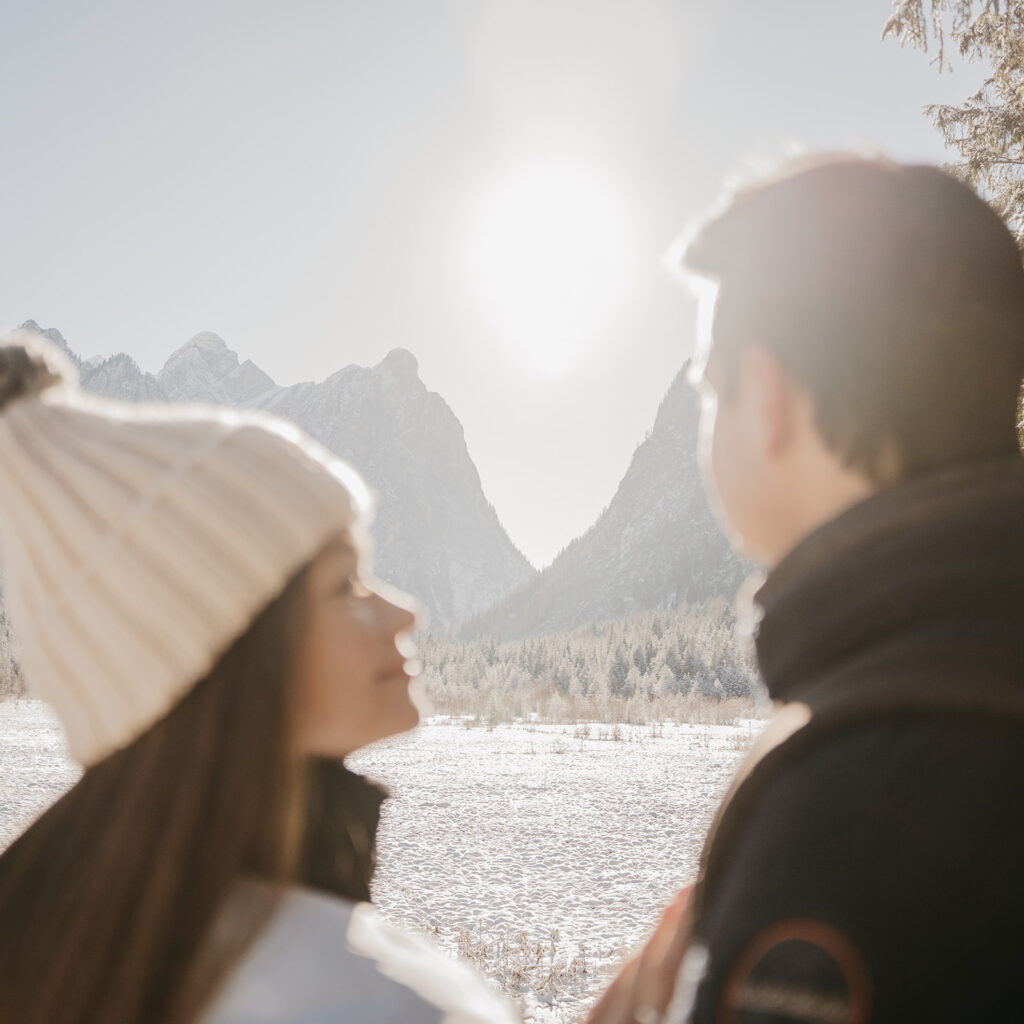 People enjoying snowy mountain view.