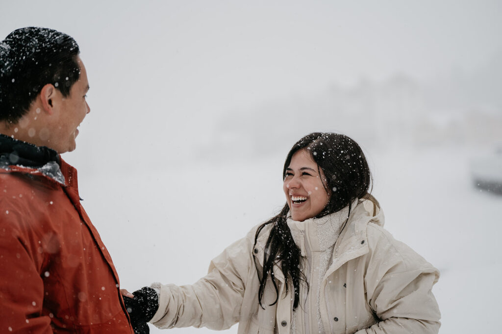 Smiling couple in snowy weather