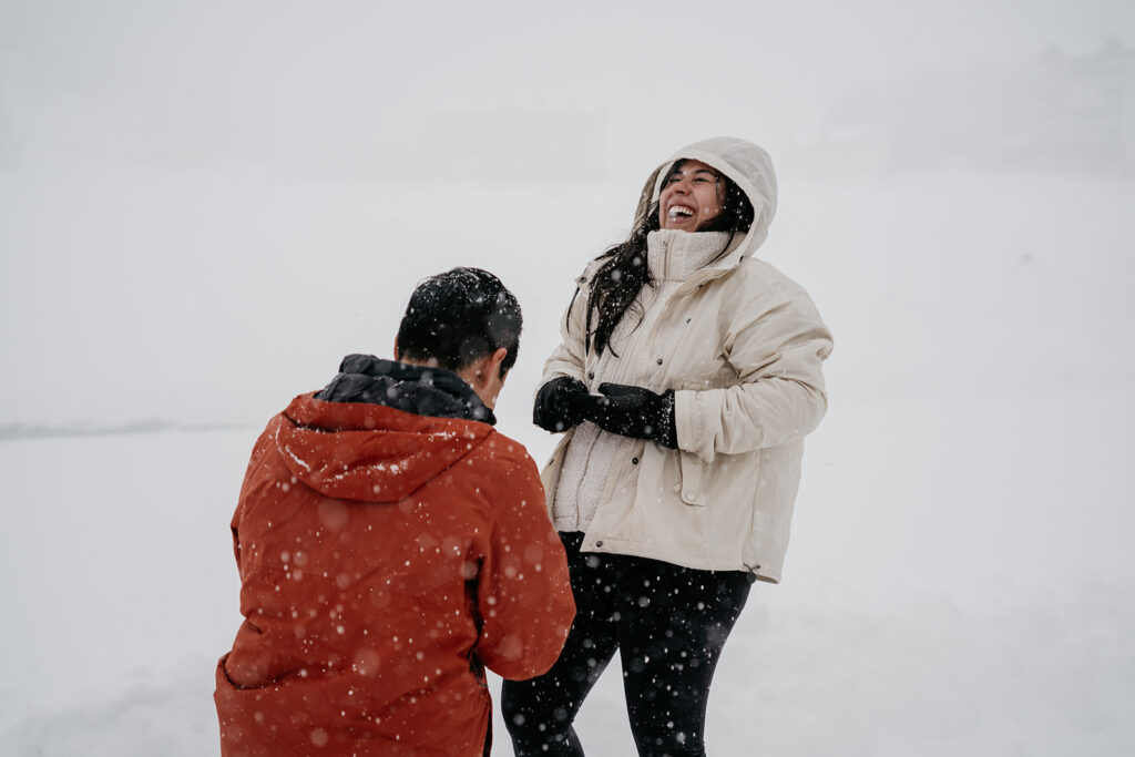 Winter proposal in snowy landscape