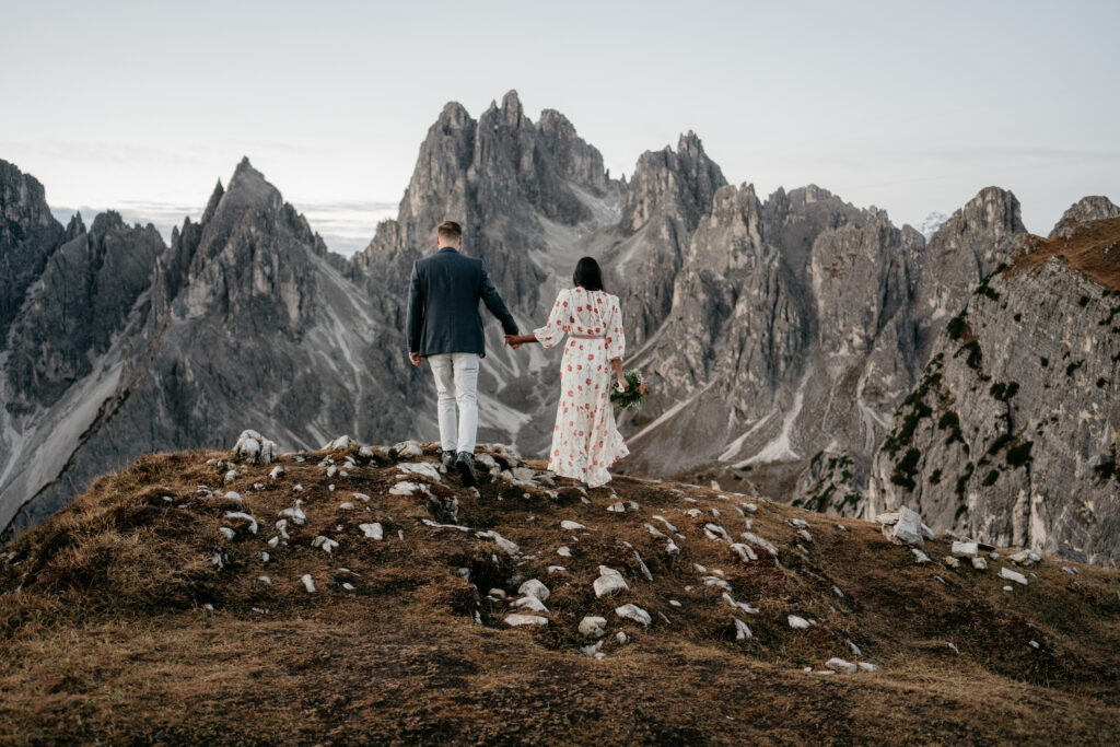 Couple walking in scenic mountain landscape