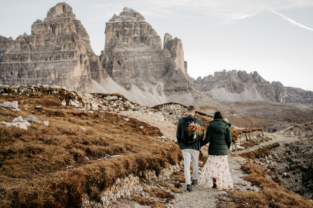 Couple hiking in scenic mountain landscape