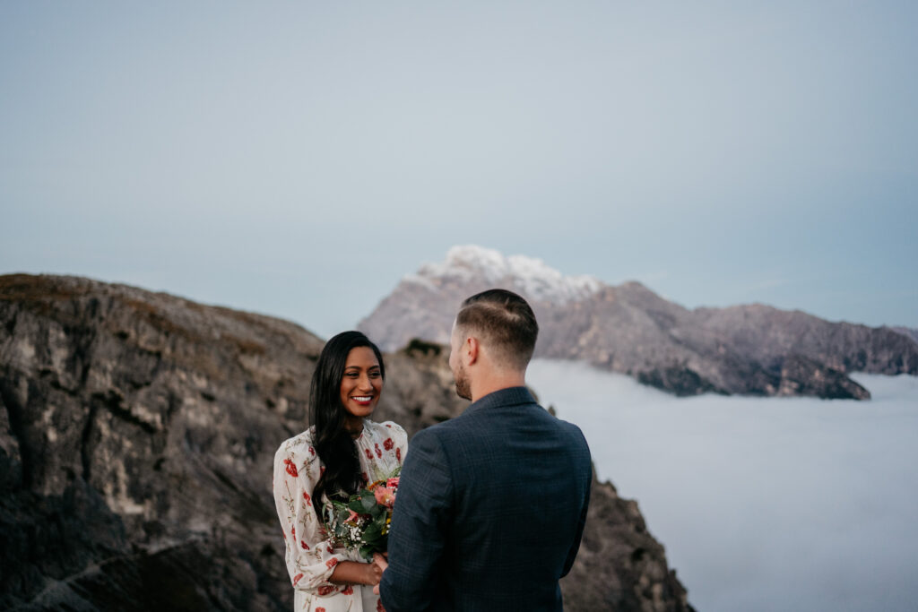 Couple smiling in mountain scenery