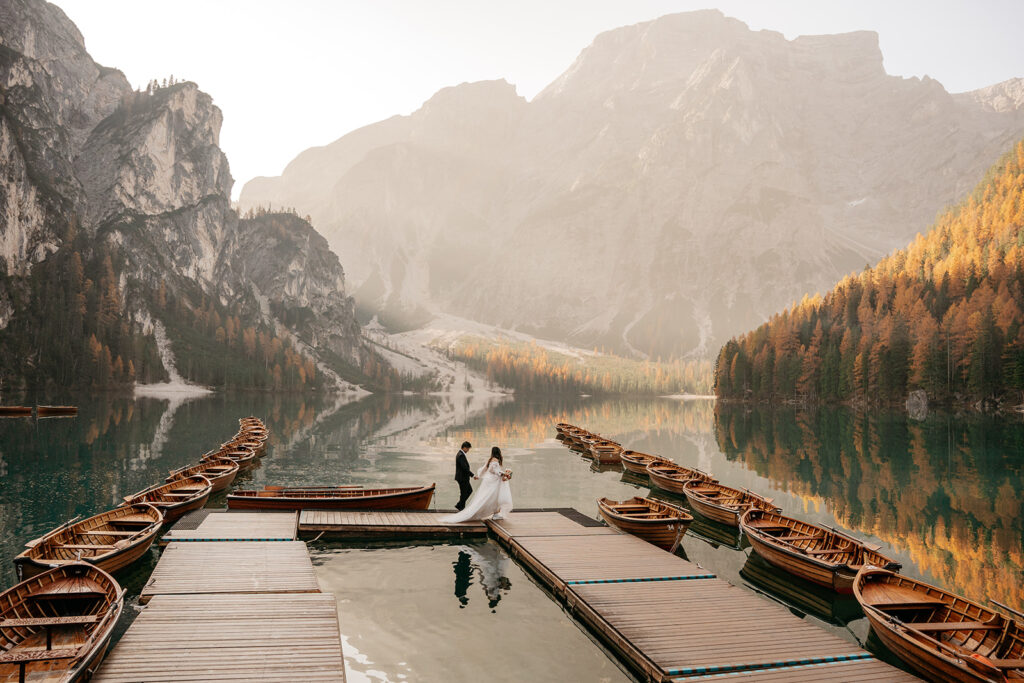 Couple on dock with mountain lake view