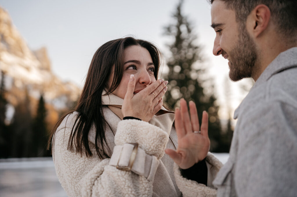 Surprised couple enjoying winter outdoors