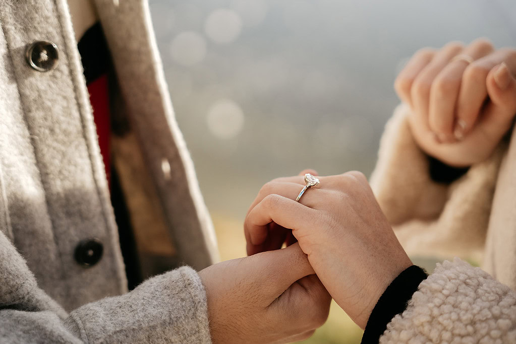 Engagement ring on woman's hand close-up