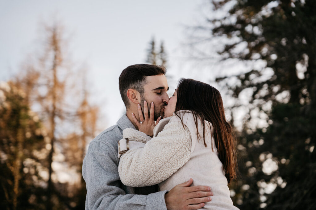 Couple kissing in winter scenery