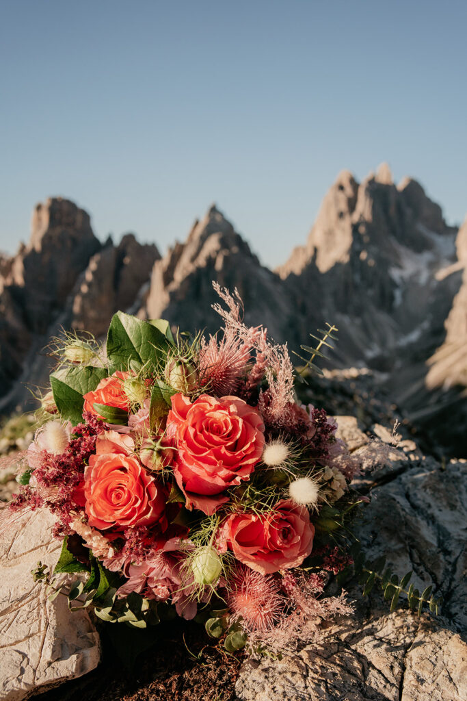 Colorful flower bouquet with mountainous backdrop