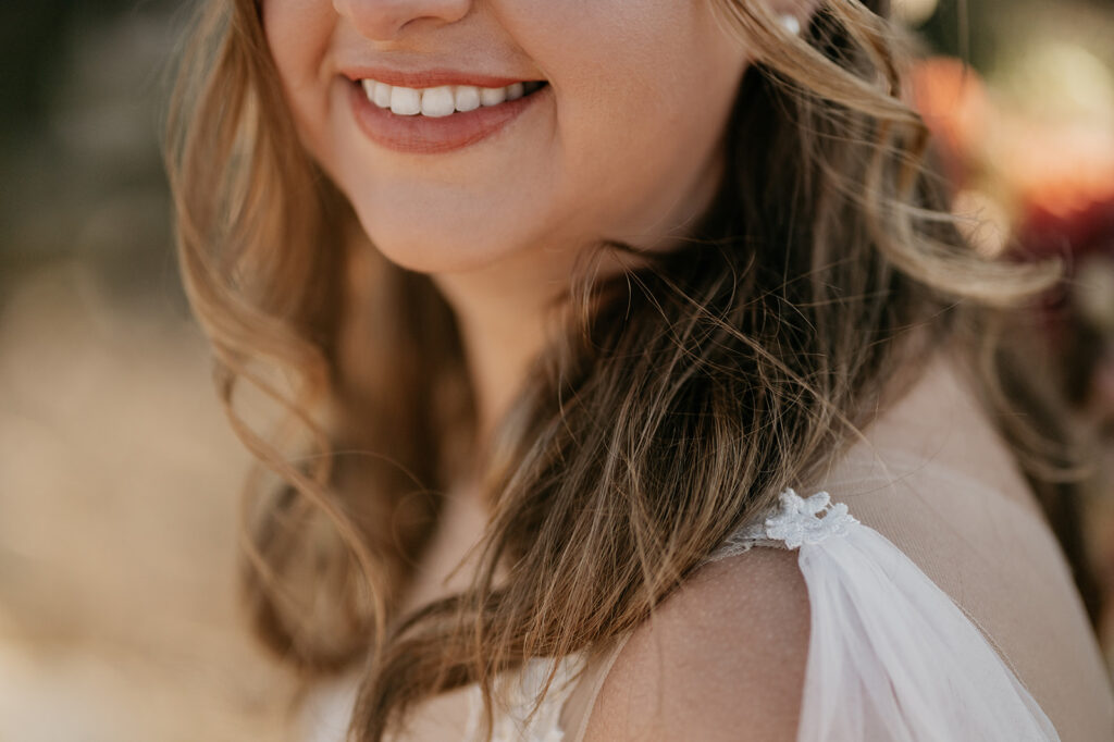 Smiling woman in bridal dress close-up