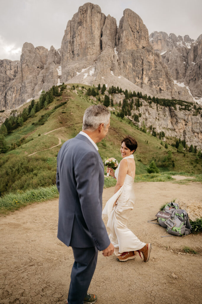 Couple smiling in mountain wedding setting