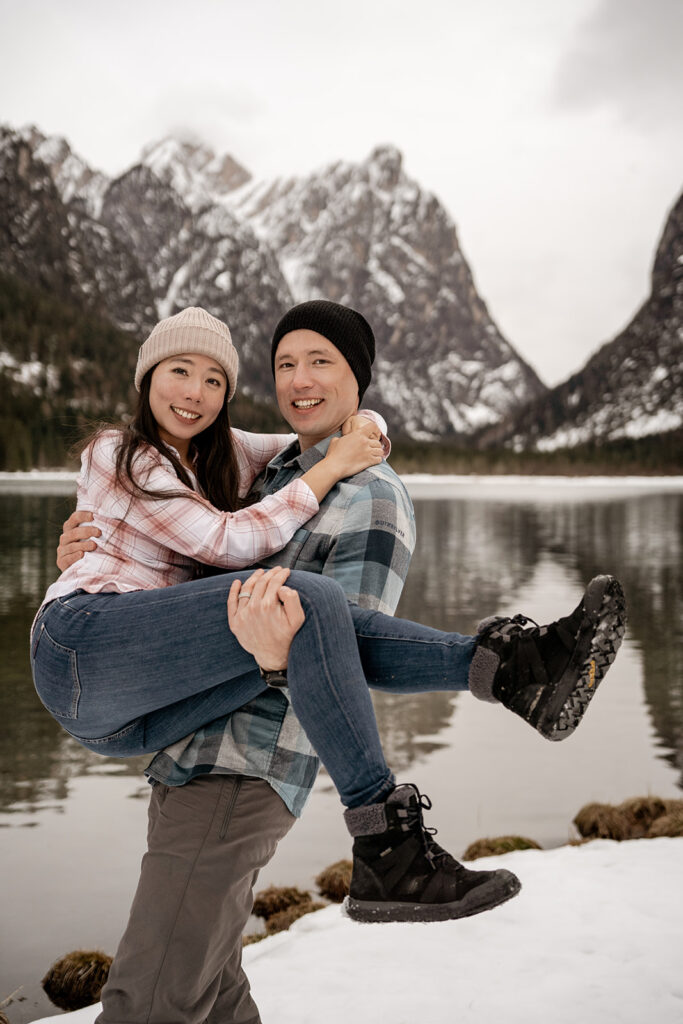 Couple enjoying snowy mountain view