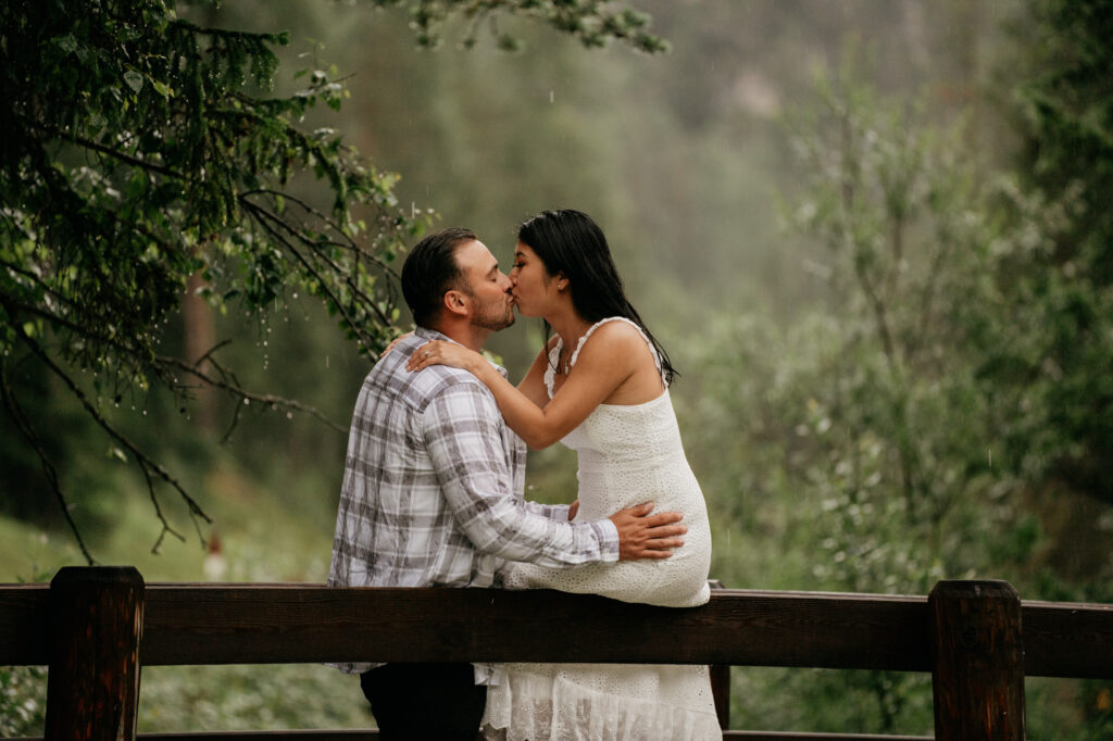 Winnie & Gianni • Chasing Raindrops and Laughter • A Playful Engagement Photoshoot in the Dolomites Rain