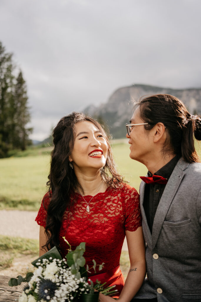 Couple smiling in scenic outdoor setting