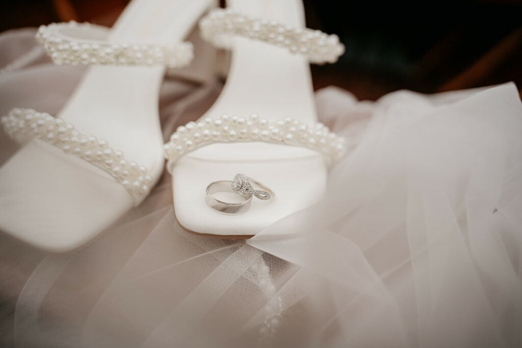 Elegant bridal shoes with wedding rings