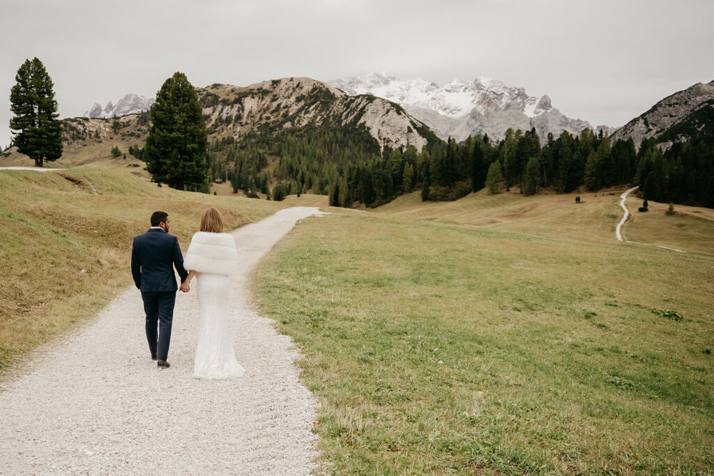 Couple walking on mountain path