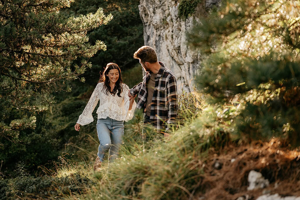 Happy couple hiking in nature together