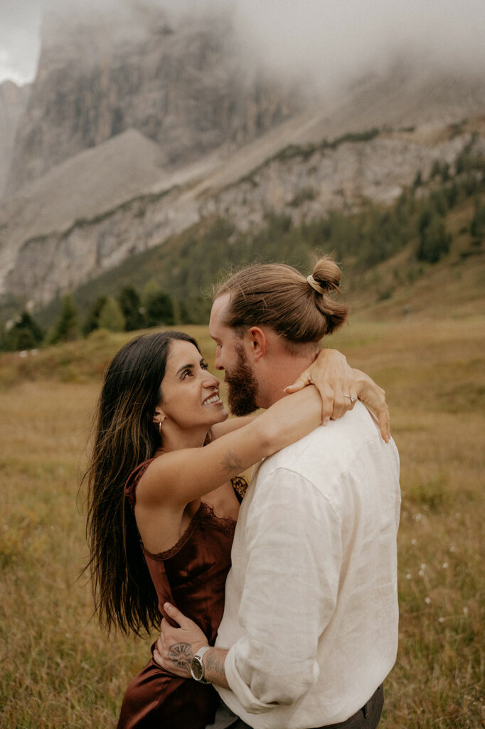Couple embracing in mountain landscape
